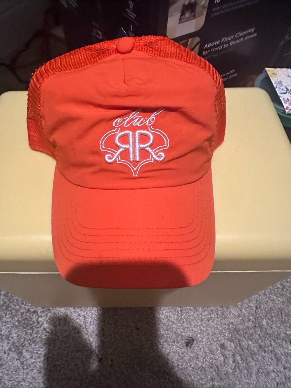 Women’s orange roller rabbit Trucker Hat